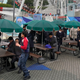 Participants are guided during an evacuation drill simulating a North Korea ballistic missile attack in Tokyo.